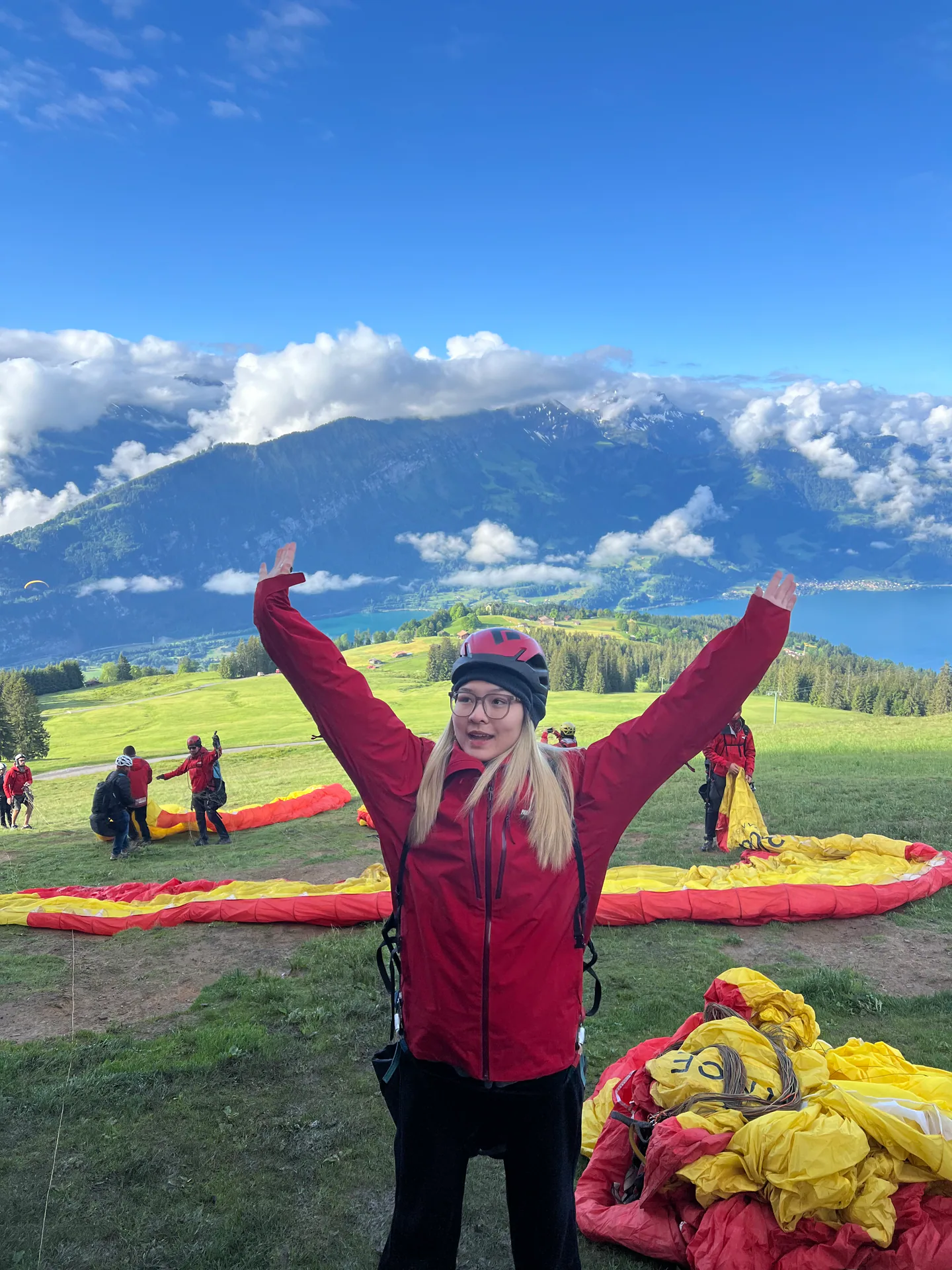 Christina preparing for a mountain gliding flight in Interlaken, Switzerland.